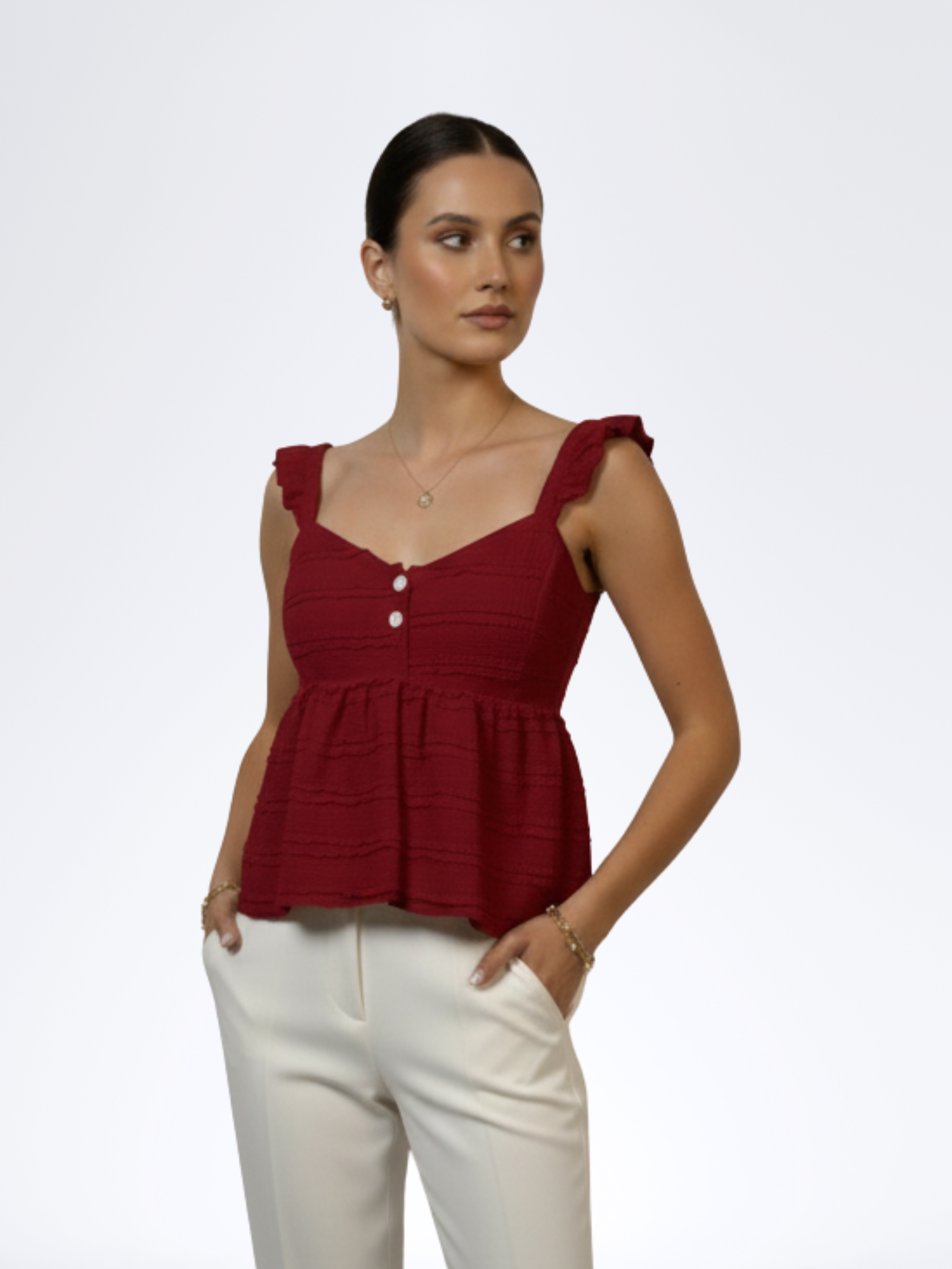 RED SLEEVELESS RUFFLETOP