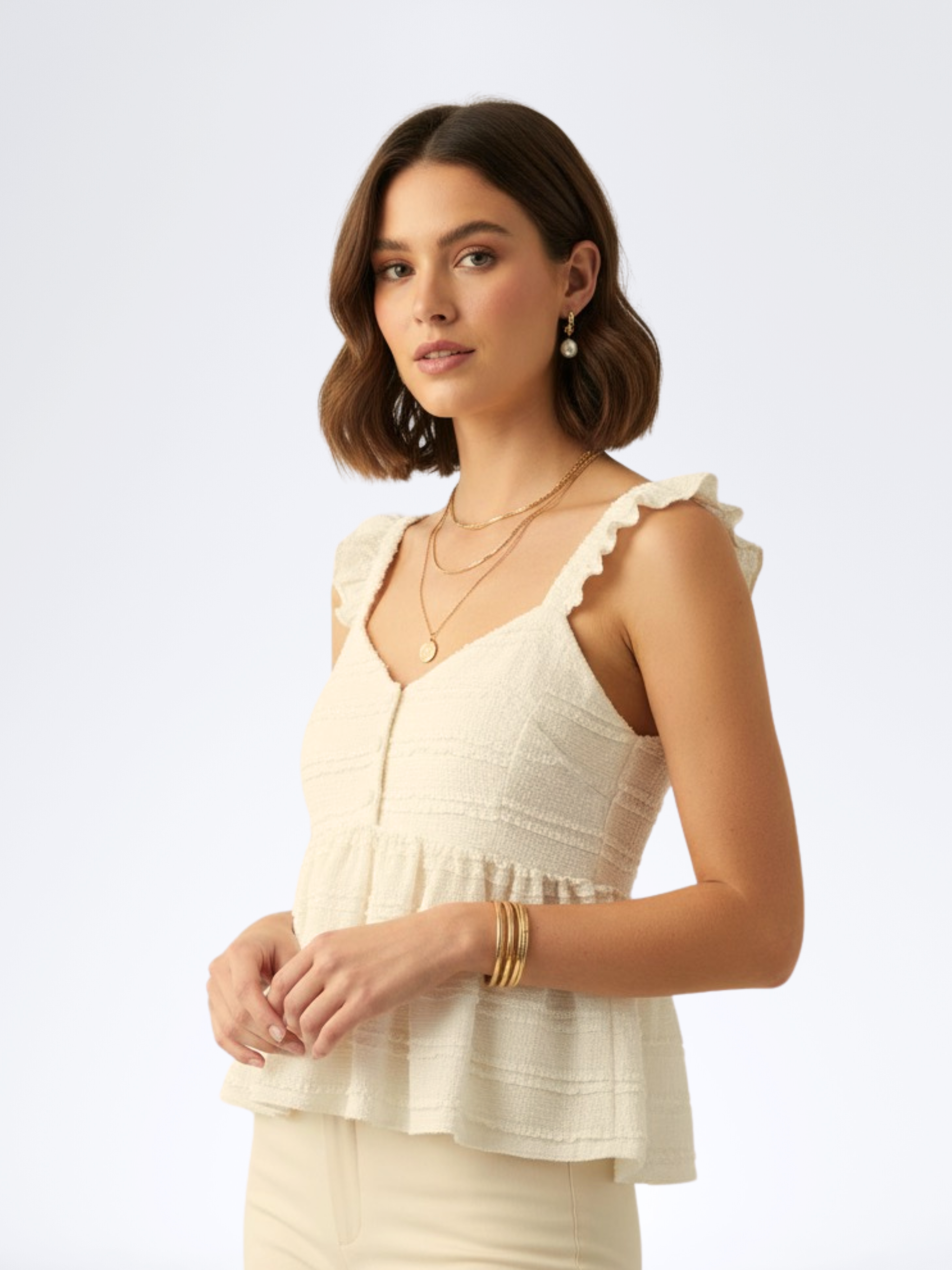 CALM WHITE SLEEVELESS RUFFLETOP